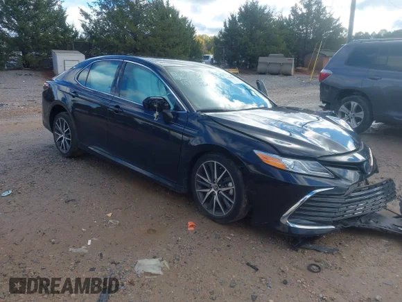 ✅ 2023 Toyota Camry Hybrid XLE • VIN: 4T1F31AK4PU608710 • Lot: 43581926. Wystawiony na IAAI z przebiegiem 51 282 mil. Bezpłatny archiwum sprzedaży aukcyjnych z USA i szczegółowy raport historii pojazdu na DreamBid. Zdjęcie 1.