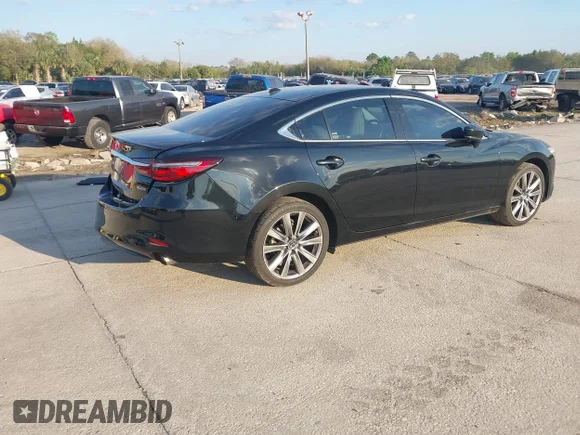 ✅ 2020 Mazda 6 Grand Touring Reserve • VIN: JM1GL1WYXL1515224 • Лот: 41666385. Опубликован ранее на IAAI с пробегом 51 425 миль. Бесплатный доступ к архиву аукционных продаж из США и подробный отчёт об истории автомобиля на DreamBid. Изображение 4.
