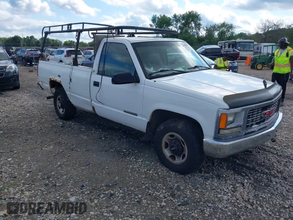 ✅ 1997 GMC Sierra 2500 • VIN: 1GTGC24R1VZ548327 • Lot: 43026086. Listed on IAAI with 292,967 mi. Free auction sales archive from the USA and detailed vehicle history report at DreamBid. Image 1.
