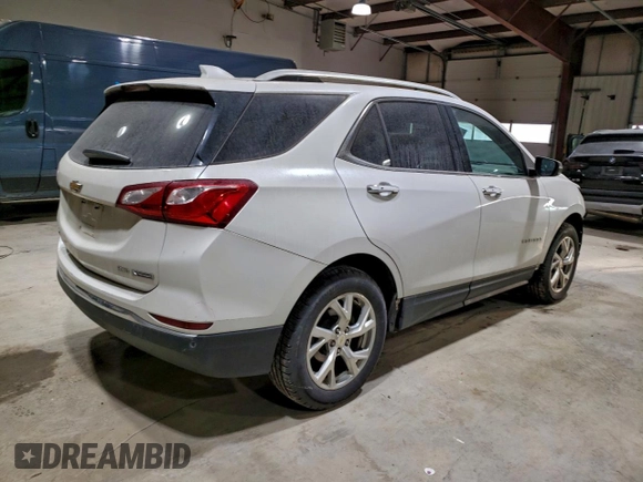 ✅ 2018 Chevrolet Equinox Premier • VIN: 2GNAXVEV2J6307574 • Lot: 96386875. Wystawiony na Copart z przebiegiem 49 187 mil. Bezpłatny archiwum sprzedaży aukcyjnych z USA i szczegółowy raport historii pojazdu na DreamBid. Zdjęcie 3.