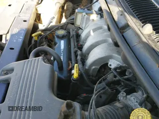 ✅ 1997 Plymouth Voyager SE • VIN: 1P4GP44R0VB307945 • Lot: 42121657. Listed on IAAI with 128,357 mi. Free auction sales archive from the USA and detailed vehicle history report at DreamBid. Image 12.