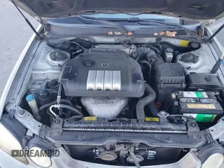 ✅ 2003 Kia Optima LX • VIN: KNAGD126035231284 • Lot: 81645434. Wystawiony na Copart z przebiegiem 133 373 mil. Bezpłatny archiwum sprzedaży aukcyjnych z USA i szczegółowy raport historii pojazdu na DreamBid. Zdjęcie 13.