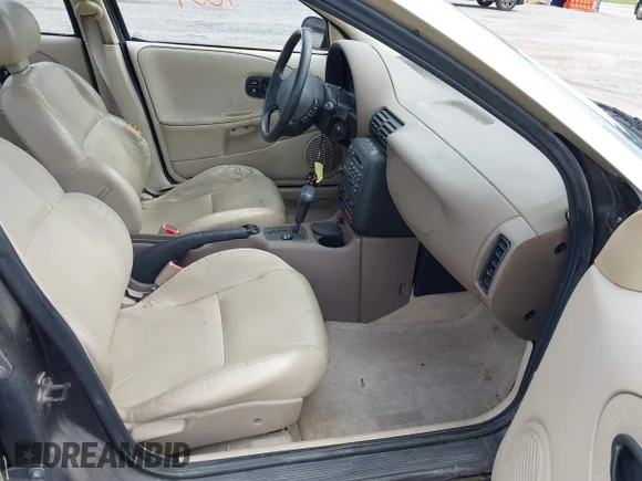 ✅ 1997 Saturn SL • VIN: 1G8ZK5277VZ372702 • Лот: 42969604. Опубликован ранее на IAAI с пробегом 86 720 миль. Бесплатный доступ к архиву аукционных продаж из США и подробный отчёт об истории автомобиля на DreamBid. Изображение 5.