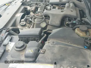 ✅ 1994 Lincoln Mark VIII • VIN: 1LNLM91V0RY766756 • Лот: 42168515. Опубликован ранее на IAAI с пробегом 134 301 миль. Бесплатный доступ к архиву аукционных продаж из США и подробный отчёт об истории автомобиля на DreamBid. Изображение 15.