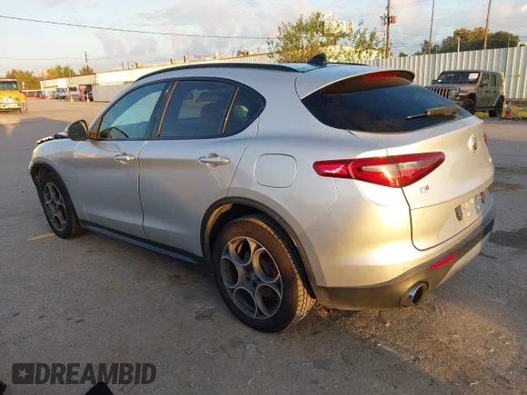 ✅ 2018 Alfa Romeo Stelvio Ti Sport • VIN: ZASFAKNN4J7B90019 • Lot: 43399343. Listed on IAAI with 107,538 mi. Free auction sales archive from the USA and detailed vehicle history report at DreamBid. Image 3.