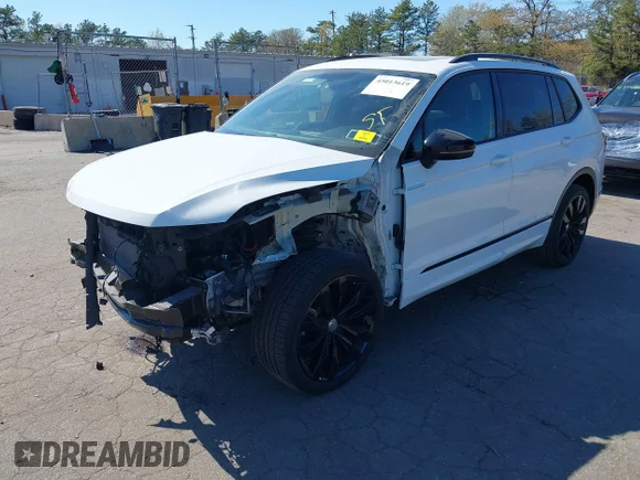 ✅ 2021 Volkswagen Tiguan SE • VIN: 3VV2B7AX6MM062756 • Lot: 45013619. Listed on IAAI with 38,926 mi. Free auction sales archive from the USA and detailed vehicle history report at DreamBid. Image 2.