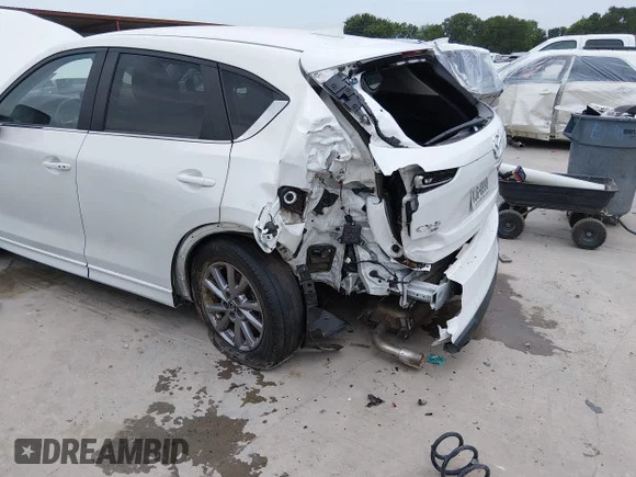 ✅ 2024 Mazda CX-5 S Select • VIN: JM3KFBBL0R0449533 • Lot: 45049015. Wystawiony na IAAI z przebiegiem 62 467 mil. Bezpłatny archiwum sprzedaży aukcyjnych z USA i szczegółowy raport historii pojazdu na DreamBid. Zdjęcie 6.