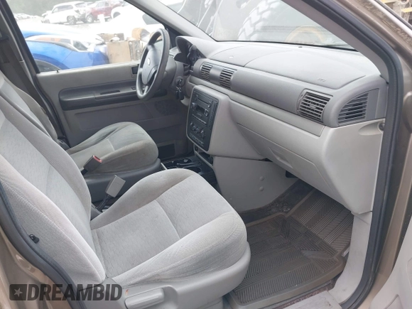 ✅ 2005 Ford Freestar SE • VIN: 2FMZA51645BA56383 • Лот: 42424377. Опубліковано раніше на IAAI з пробігом 174 059 миль. Безкоштовний доступ до архіву аукціонних продажів зі США та докладний звіт про історію автомобіля на DreamBid. Зображення 5.
