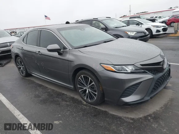 ✅ 2018 Toyota Camry XLE • VIN: 4T1B11HK9JU058731 • Лот: 44340064. Опубликован ранее на IAAI с пробегом 100 845 миль. Бесплатный доступ к архиву аукционных продаж из США и подробный отчёт об истории автомобиля на DreamBid. Изображение 1.