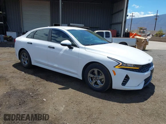 ✅ 2022 Kia K5 LXS • VIN: 5XXG14J27NG147859 • Лот: 43011723. Опубліковано раніше на IAAI з пробігом 17 565 миль. Безкоштовний доступ до архіву аукціонних продажів зі США та докладний звіт про історію автомобіля на DreamBid. Зображення 1.