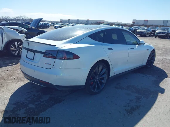✅ 2015 Tesla Model S 85D • VIN: 5YJSA1H48FF082038 • Lot: 41712242. Listed on IAAI with 58,297 mi. Free auction sales archive from the USA and detailed vehicle history report at DreamBid. Image 4.