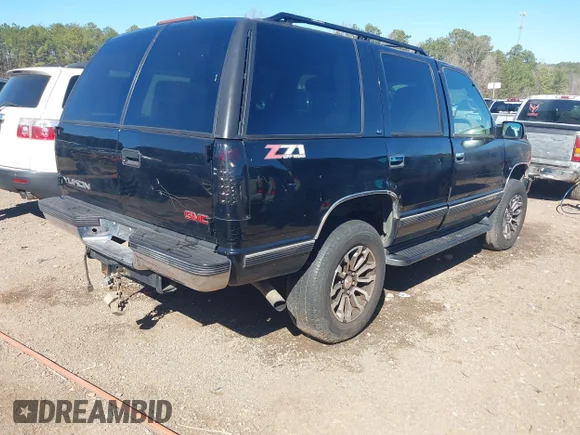 ✅ 1999 GMC Yukon • VIN: 1GKEK13R4XJ762708 • Lot: 41653291. Wystawiony na IAAI z przebiegiem 200 240 mil. Bezpłatny archiwum sprzedaży aukcyjnych z USA i szczegółowy raport historii pojazdu na DreamBid. Zdjęcie 4.