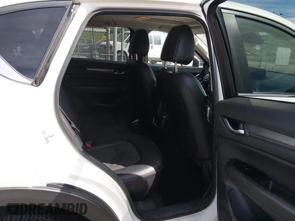 ✅ 2019 Mazda CX-5 Touring • VIN: JM3KFBCMXK0566937 • Лот: 45093854. Опубліковано раніше на IAAI з пробігом 99 344 миль. Безкоштовний доступ до архіву аукціонних продажів зі США та докладний звіт про історію автомобіля на DreamBid. Зображення 8.