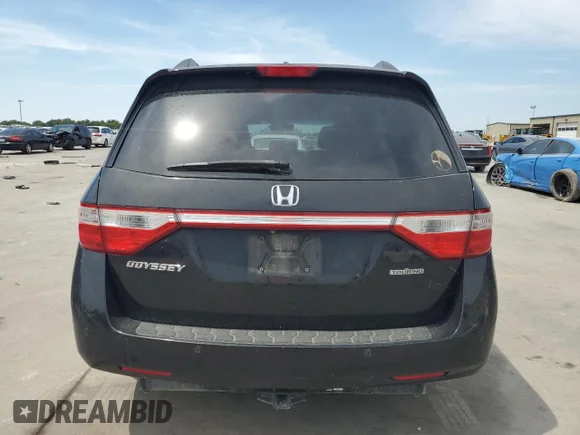 ✅ 2011 Honda Odyssey Touring • VIN: 5FNRL5H96BB023236 • Лот: 67565504. Опубліковано раніше на Copart з пробігом 212 656 миль. Безкоштовний доступ до архіву аукціонних продажів зі США та докладний звіт про історію автомобіля на DreamBid. Зображення 6.