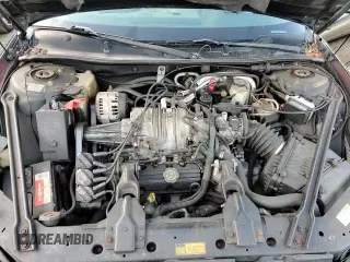 ✅ 1999 Pontiac Grand Prix GTP • VIN: 1G2WR5215XF324639 • Lot: 84797744. Listed on Copart with 328,108 mi. Free auction sales archive from the USA and detailed vehicle history report at DreamBid. Image 13.