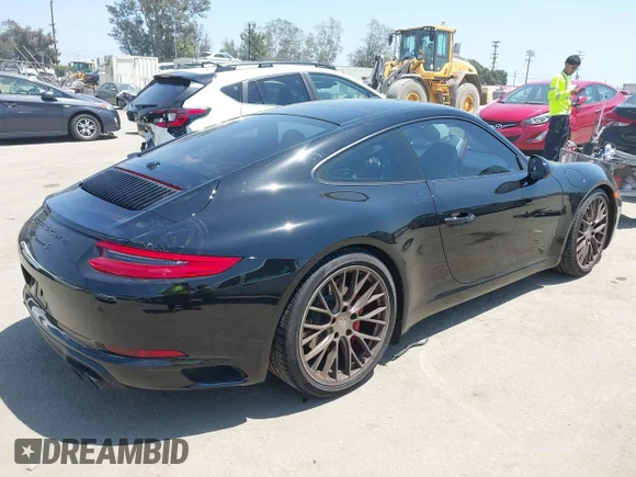 ✅ 2017 Porsche 911 Carrera S • VIN: WP0AB2A92HS123063 • Лот: 42207005. Опубліковано раніше на IAAI з пробігом 80 270 миль. Безкоштовний доступ до архіву аукціонних продажів зі США та докладний звіт про історію автомобіля на DreamBid. Зображення 4.