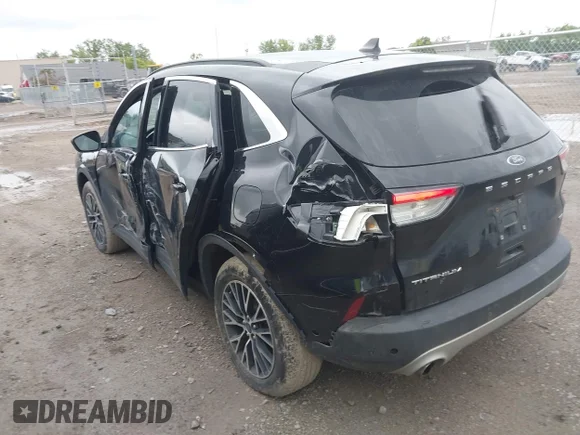 ✅ 2021 Ford Escape Titanium Plug-In Hybrid • VIN: 1FMCU0LZ5MUA67361 • Lot: 43030703. Wystawiony na IAAI z przebiegiem 71 754 mil. Bezpłatny archiwum sprzedaży aukcyjnych z USA i szczegółowy raport historii pojazdu na DreamBid. Zdjęcie 3.