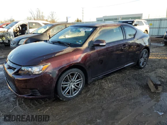 ✅ 2011 Scion tC • VIN: JTKJF5C75B3004189 • Lot: 42960185. Wystawiony na Copart z przebiegiem 72 068 mil. Bezpłatny archiwum sprzedaży aukcyjnych z USA i szczegółowy raport historii pojazdu na DreamBid. Zdjęcie 1.