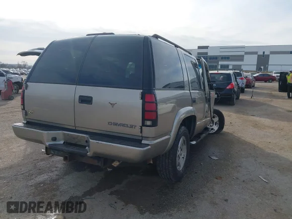 ✅ 1999 Chevrolet Tahoe Z71 • VIN: 1GNEK13R1XR153810 • Lot: 44114588. Wystawiony na IAAI z przebiegiem 163 903 mil. Bezpłatny archiwum sprzedaży aukcyjnych z USA i szczegółowy raport historii pojazdu na DreamBid. Zdjęcie 4.