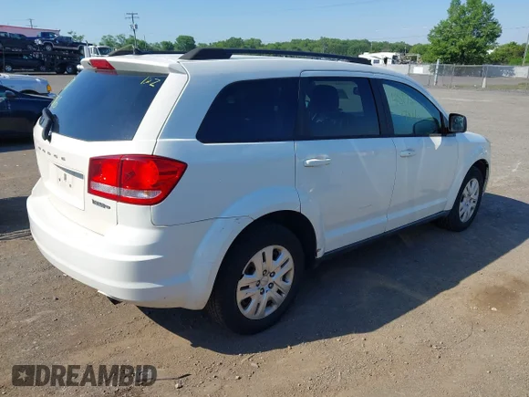 ✅ 2014 Dodge Journey American Value • VIN: 3C4PDCAB0ET312169 • Lot: 45177816. Listed on IAAI with 153,440 mi. Free auction sales archive from the USA and detailed vehicle history report at DreamBid. Image 4.