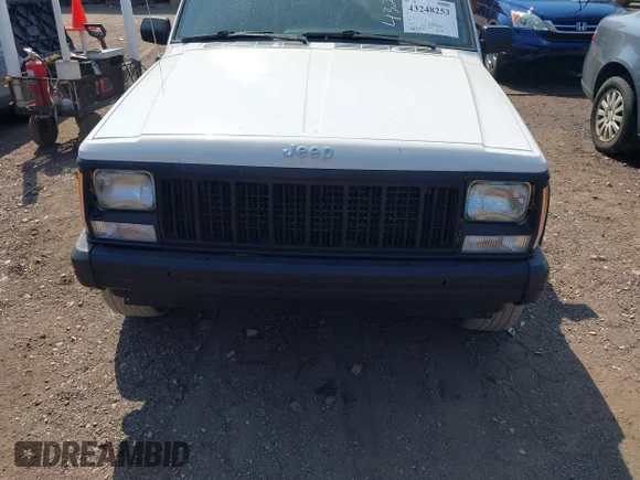 ✅ 1996 Jeep Cherokee Sport • VIN: 1J4FT68SXTL276970 • Lot: 43248253. Listed on IAAI with 188,339 mi. Free auction sales archive from the USA and detailed vehicle history report at DreamBid. Image 6.