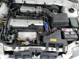 2002 Hyundai Accent GL z VIN KMHCG45C92U271388, wystawiony jako Copart lot #85925124 z przebiegiem 98 390 mil mil oraz Szkoda całkowita • Salvage title. Historia ofert i sprzedaży dostępna na DreamBid. Obrazek 13.