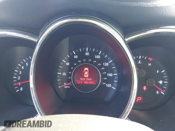 ✅ 2013 Kia Optima LX • VIN: KNAGM4A78D5414025 • Лот: 43917420. Опубліковано раніше на IAAI з пробігом 186 184 миль. Безкоштовний доступ до архіву аукціонних продажів зі США та докладний звіт про історію автомобіля на DreamBid. Зображення 7.