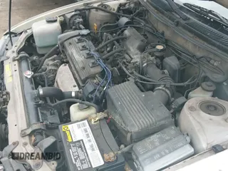 ✅ 1997 Toyota Corolla CE • VIN: 1NXBA02E8VZ665187 • Lot: 42927068. Wystawiony na IAAI z przebiegiem 169 637 mil. Bezpłatny archiwum sprzedaży aukcyjnych z USA i szczegółowy raport historii pojazdu na DreamBid. Zdjęcie 19.