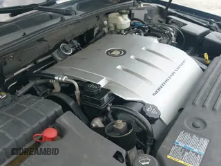 ✅ 2006 Cadillac DTS 1SE • VIN: 1G6KD57976U122938 • Лот: 42751798. Опубликован ранее на IAAI с пробегом 133 589 миль. Бесплатный доступ к архиву аукционных продаж из США и подробный отчёт об истории автомобиля на DreamBid. Изображение 12.