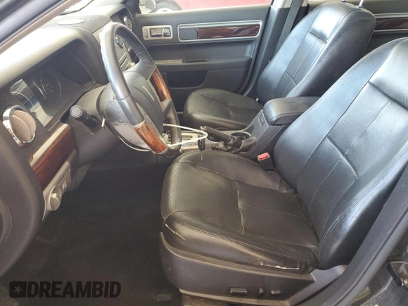 ✅ 2007 Lincoln MKZ • VIN: 3LNHM26T87R636076 • Lot: 82463605. Wystawiony na Copart z przebiegiem 107 401 mil. Bezpłatny archiwum sprzedaży aukcyjnych z USA i szczegółowy raport historii pojazdu na DreamBid. Zdjęcie 7.