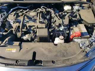 ✅ 2024 Toyota Corolla Hybrid SE • VIN: JTDBCMFE5R3027409 • Lot: 90370585. Wystawiony na Copart z przebiegiem 28 301 mil. Bezpłatny archiwum sprzedaży aukcyjnych z USA i szczegółowy raport historii pojazdu na DreamBid. Zdjęcie 15.