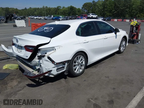 ✅ 2023 Toyota Camry LE • VIN: 4T1C11AK7PU165350 • Lot: 44931859. Wystawiony na IAAI z przebiegiem 42 440 mil. Bezpłatny archiwum sprzedaży aukcyjnych z USA i szczegółowy raport historii pojazdu na DreamBid. Zdjęcie 4.