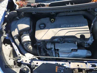 2018 Chevrolet Cruze LT z VIN 3G1BE6SM2JS522970, wystawiony jako Copart lot #87227265 z przebiegiem 94 043 mil mil oraz Czysty tytuł • Clean title. Historia ofert i sprzedaży dostępna na DreamBid. Obrazek 13.