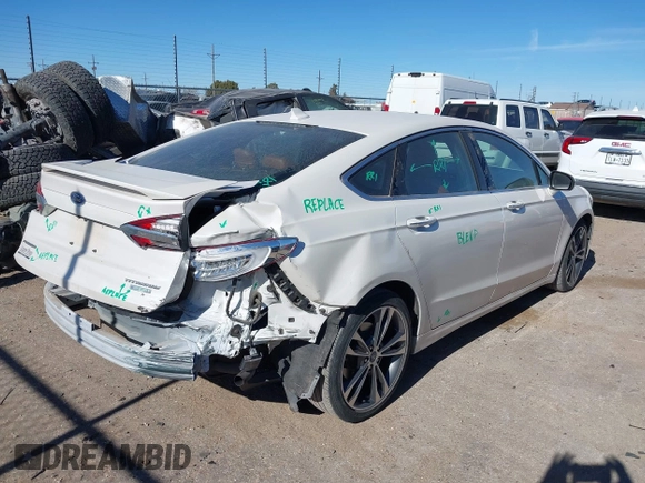 ✅ 2020 Ford Fusion Titanium • VIN: 3FA6P0K91LR126119 • Lot: 43898227. Wystawiony na IAAI z przebiegiem 49 977 mil. Bezpłatny archiwum sprzedaży aukcyjnych z USA i szczegółowy raport historii pojazdu na DreamBid. Zdjęcie 4.