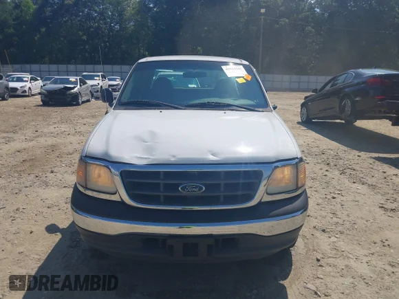 ✅ 2001 Ford F-150 XL • VIN: 1FTRX17W61NB32655 • Lot: 42563141. Wystawiony na IAAI z przebiegiem 226 796 mil. Bezpłatny archiwum sprzedaży aukcyjnych z USA i szczegółowy raport historii pojazdu na DreamBid. Zdjęcie 6.