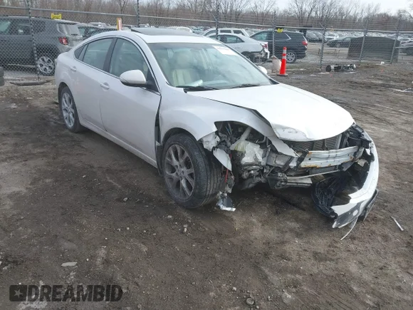 ✅ 2013 Mazda 6 S Grand Touring • VIN: 1YVHZ8CB8D5M11234 • Лот: 44215669. Опубликован ранее на IAAI с пробегом 142 385 миль. Бесплатный доступ к архиву аукционных продаж из США и подробный отчёт об истории автомобиля на DreamBid. Изображение 1.