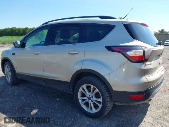 ✅ 2017 Ford Escape SE • VIN: 1FMCU0GD5HUA87386 • Lot: 45218578. Wystawiony na IAAI z przebiegiem 214 931 mil. Bezpłatny archiwum sprzedaży aukcyjnych z USA i szczegółowy raport historii pojazdu na DreamBid. Zdjęcie 3.