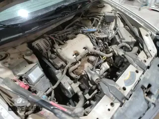 ✅ 2004 Chevrolet Impala • VIN: 2G1WF52EX49221785 • Lot: 86170834. Wystawiony na Copart z przebiegiem 186 785 mil. Bezpłatny archiwum sprzedaży aukcyjnych z USA i szczegółowy raport historii pojazdu na DreamBid. Zdjęcie 13.