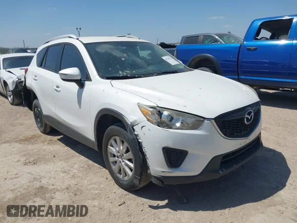 ✅ 2015 Mazda CX-5 Sport • VIN: JM3KE2BE1F0482556 • Lot: 44718728. Listed on IAAI with 145,759 mi. Free auction sales archive from the USA and detailed vehicle history report at DreamBid. Image 1.