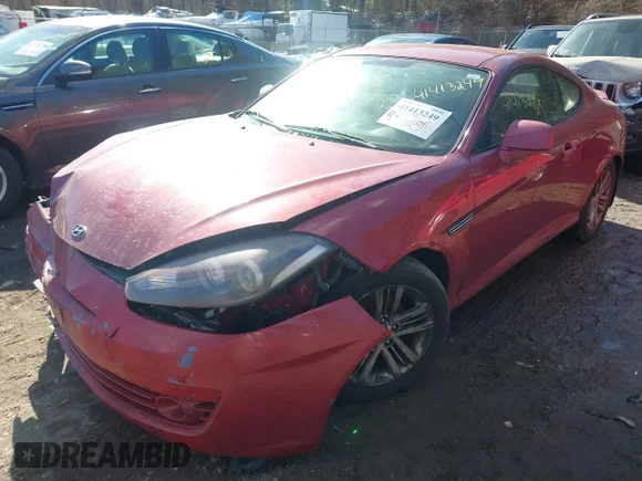 ✅ 2008 Hyundai Tiburon GS • VIN: KMHHM66D58U282754 • Lot: 41413249. Wystawiony na IAAI z przebiegiem 134 052 mil. Bezpłatny archiwum sprzedaży aukcyjnych z USA i szczegółowy raport historii pojazdu na DreamBid. Zdjęcie 2.