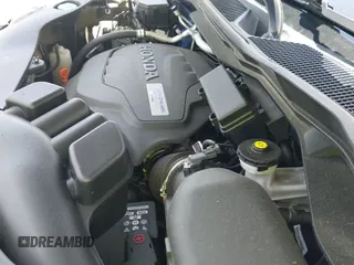 ✅ 2020 Honda Passport Elite • VIN: 5FNYF8H08LB002234 • Lot: 42535770. Listed on IAAI with 105,003 mi. Free auction sales archive from the USA and detailed vehicle history report at DreamBid. Image 19.