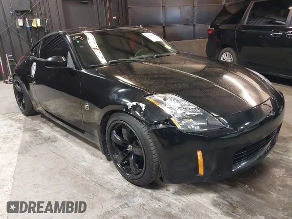 ✅ 2005 Nissan 350Z Touring • VIN: JN1AZ34E45M653631 • Lot: 41689560. Wystawiony na IAAI z przebiegiem 147 635 mil. Bezpłatny archiwum sprzedaży aukcyjnych z USA i szczegółowy raport historii pojazdu na DreamBid. Zdjęcie 1.