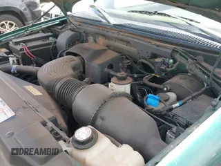 ✅ 1999 Ford F-150 XL • VIN: 1FTRX17L5XKA29212 • Lot: 42359916. Listed on IAAI with 131,137 mi. Free auction sales archive from the USA and detailed vehicle history report at DreamBid. Image 12.