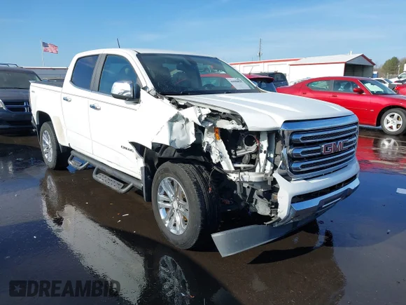✅ 2015 GMC Canyon 4WD SLT • VIN: 1GTG6CE31F1197443 • Lot: 43998828. Listed on IAAI with 149,447 mi. Free auction sales archive from the USA and detailed vehicle history report at DreamBid. Image 1.
