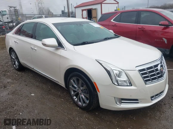 ✅ 2013 Cadillac XTS Luxury • VIN: 2G61P5S36D9191085 • Lot: 43786610. Listed on IAAI with 130,315 mi. Free auction sales archive from the USA and detailed vehicle history report at DreamBid. Image 1.