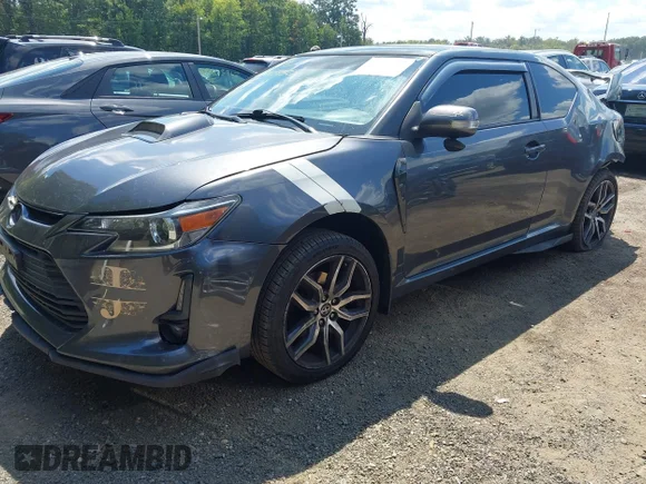✅ 2014 Scion tC • VIN: JTKJF5C76E3081836 • Lot: 43115950. Wystawiony na IAAI z przebiegiem 170 820 mil. Bezpłatny archiwum sprzedaży aukcyjnych z USA i szczegółowy raport historii pojazdu na DreamBid. Zdjęcie 2.