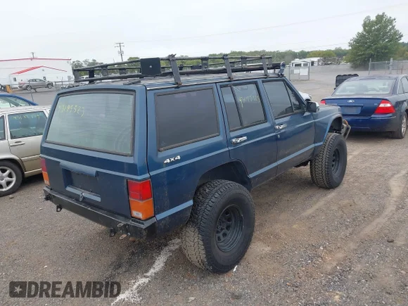 ✅ 1991 Jeep Cherokee • VIN: 1J4FJ58SXML597313 • Лот: 43195523. Опубліковано раніше на IAAI з пробігом 240 828 миль. Безкоштовний доступ до архіву аукціонних продажів зі США та докладний звіт про історію автомобіля на DreamBid. Зображення 4.