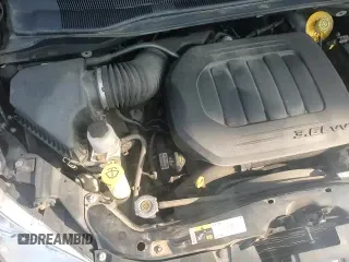 ✅ 2019 Dodge Grand Caravan Crew • VIN: 2C4RDGDG9KR599159 • Lot: 68274145. Wystawiony na Copart z przebiegiem 96 462 mil. Bezpłatny archiwum sprzedaży aukcyjnych z USA i szczegółowy raport historii pojazdu na DreamBid. Zdjęcie 14.