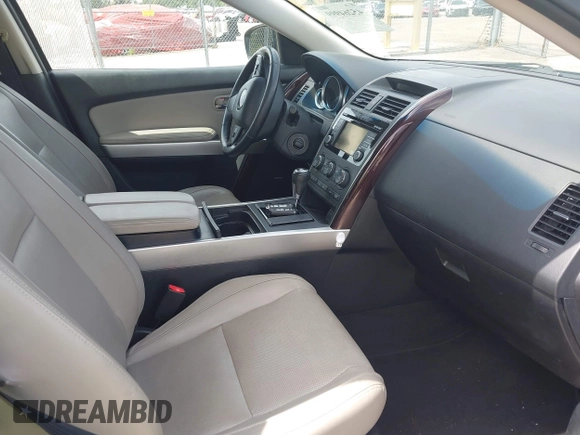 ✅ 2014 Mazda CX-9 Grand Touring • VIN: JM3TB3DV1E0438507 • Лот: 45264999. Опубліковано раніше на IAAI з пробігом 133 915 миль. Безкоштовний доступ до архіву аукціонних продажів зі США та докладний звіт про історію автомобіля на DreamBid. Зображення 5.