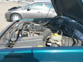 ✅ 1998 Jeep Cherokee Sport • VIN: 1J4FJ68S2WL136129 • Lot: 41810918. Listed on IAAI with 269,989 mi. Free auction sales archive from the USA and detailed vehicle history report at DreamBid. Image 12.